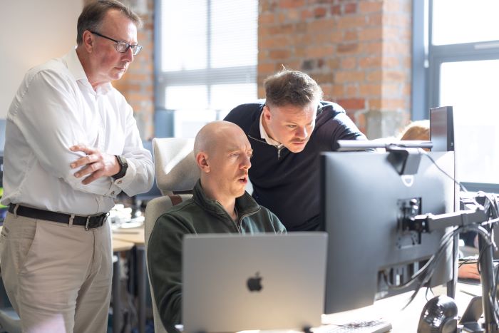 Bob, Ben and Tony at a workstation