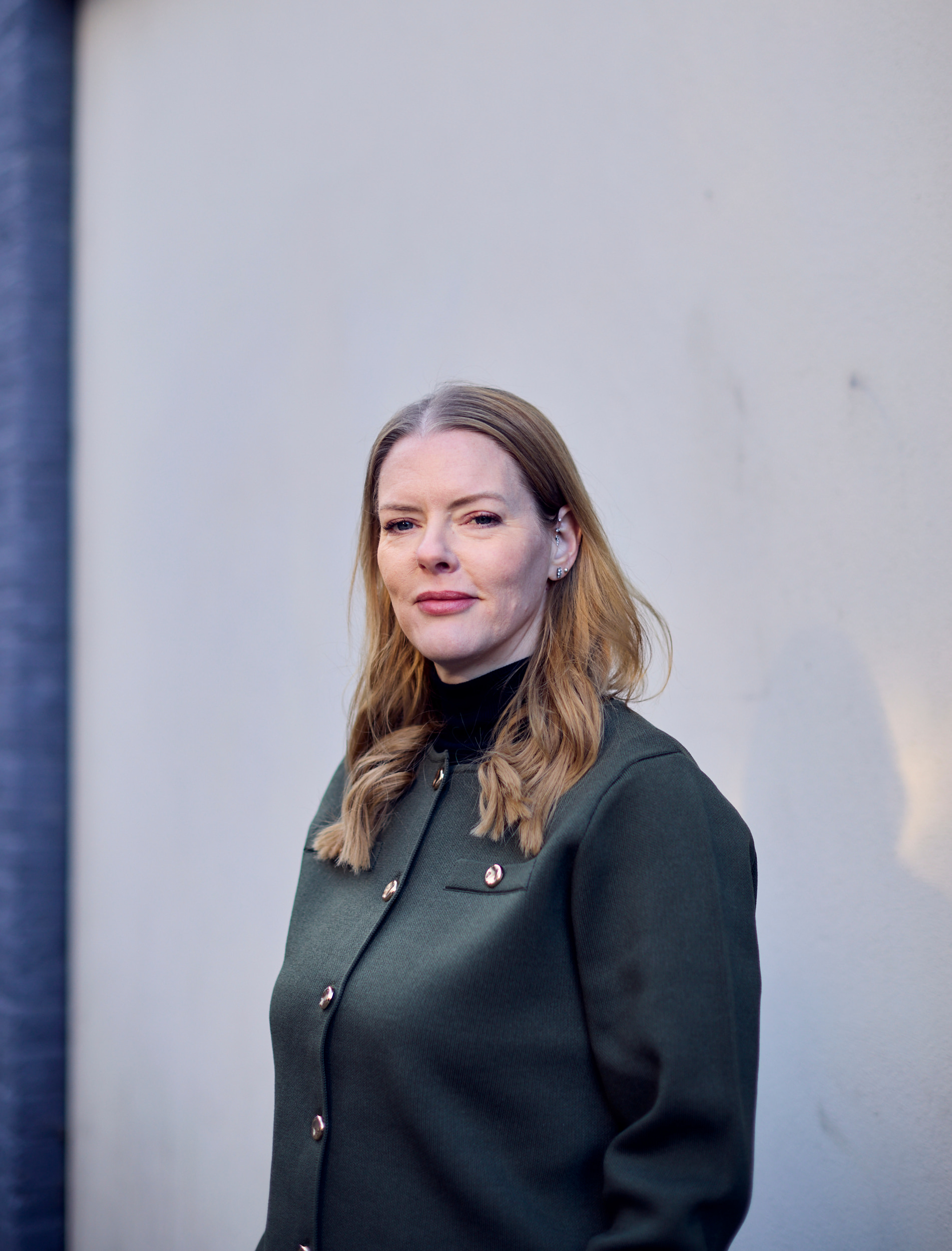 Howden's Kelly Clark posing outside against a white wall