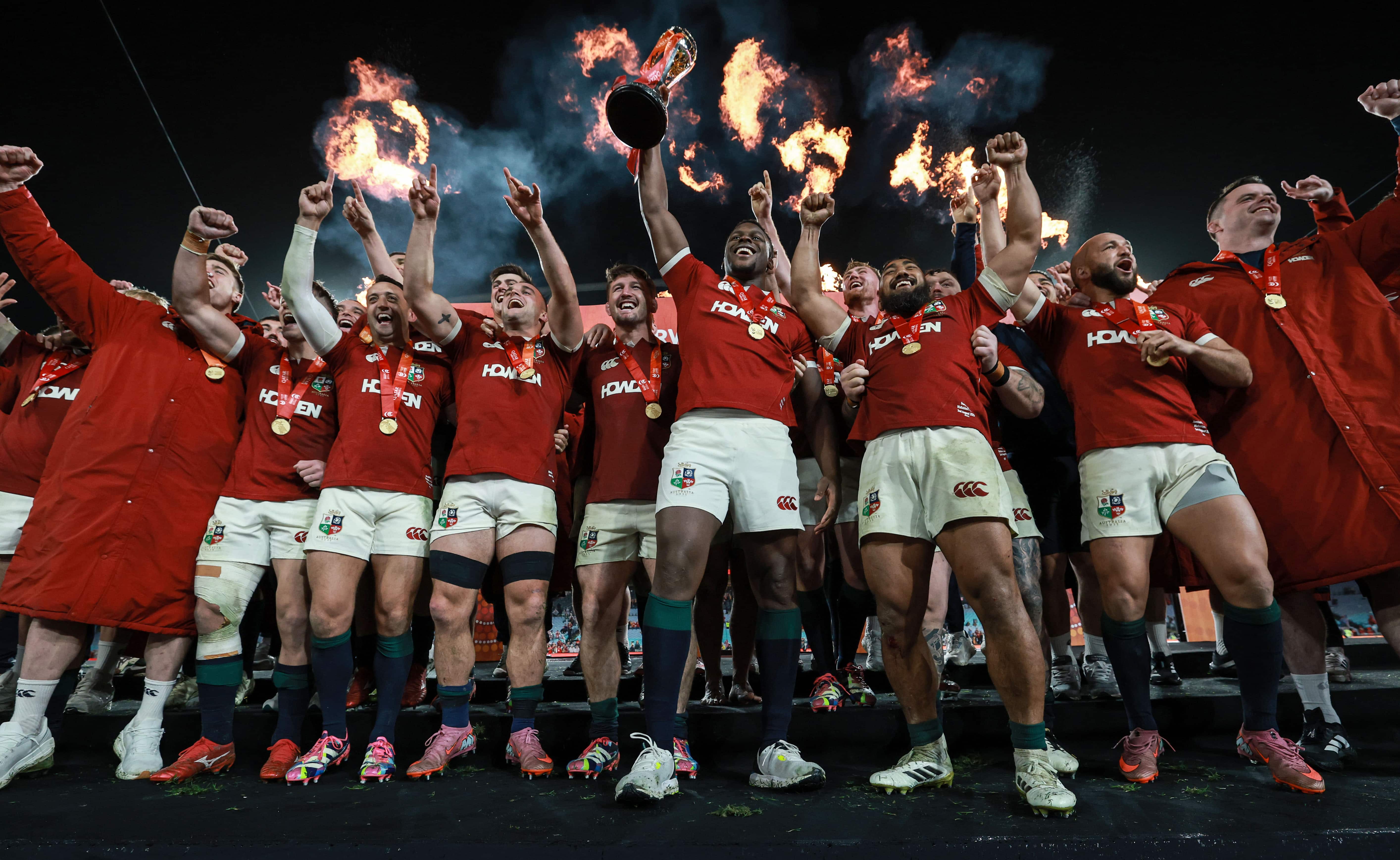 The British & Irish Lions rugby team hoisting their trophy