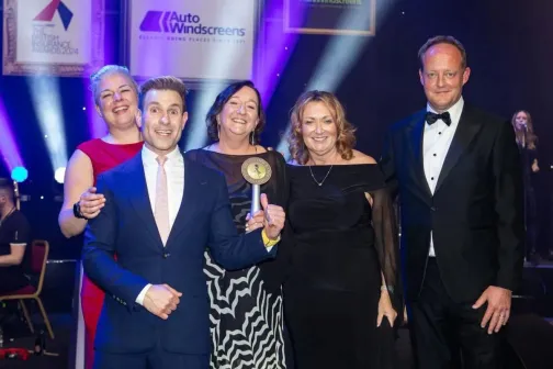 Howden staff collecting insurance broker of the decade award